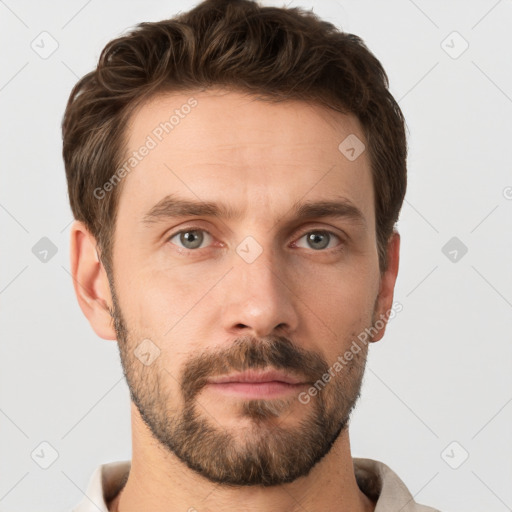 Neutral white young-adult male with short  brown hair and grey eyes