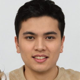 Joyful asian young-adult male with short  brown hair and brown eyes