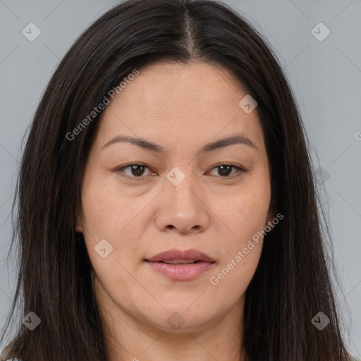 Joyful asian young-adult female with long  brown hair and brown eyes