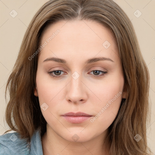 Neutral white young-adult female with long  brown hair and brown eyes