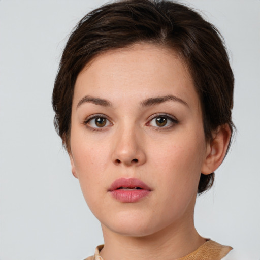 Neutral white young-adult female with short  brown hair and brown eyes