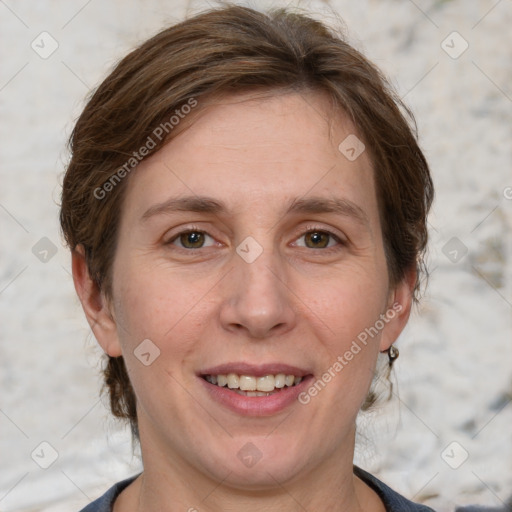 Joyful white adult female with short  brown hair and grey eyes