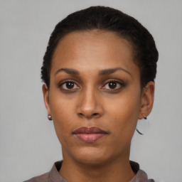 Neutral latino young-adult female with short  black hair and brown eyes