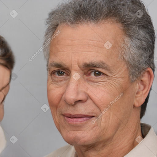 Joyful white middle-aged male with short  brown hair and brown eyes