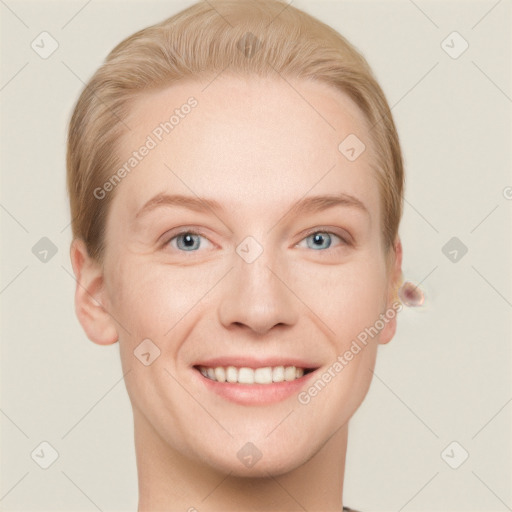 Joyful white young-adult female with short  brown hair and grey eyes