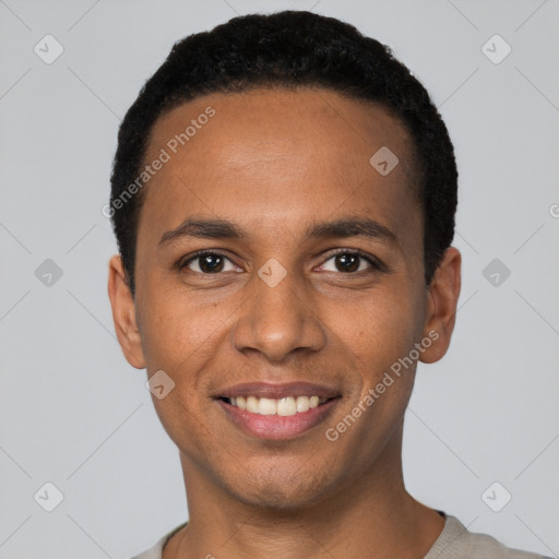 Joyful black young-adult male with short  black hair and brown eyes