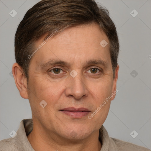 Joyful white adult male with short  brown hair and grey eyes