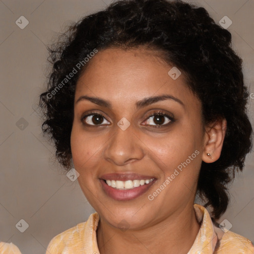 Joyful black young-adult female with medium  brown hair and brown eyes