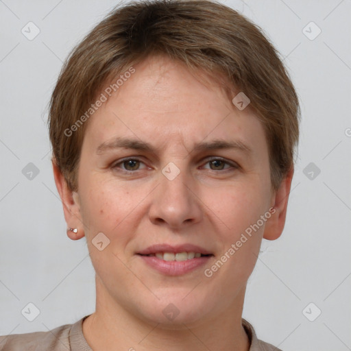 Joyful white young-adult female with short  brown hair and grey eyes