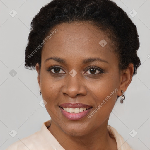 Joyful black young-adult female with short  brown hair and brown eyes