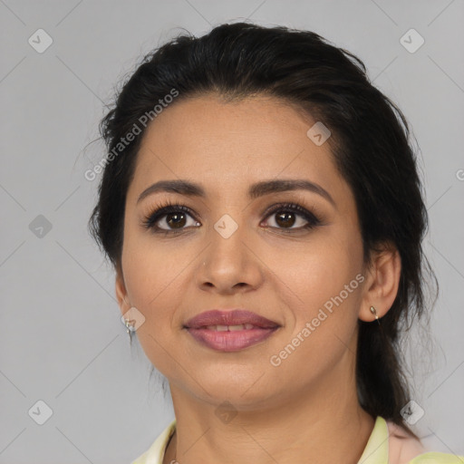 Joyful latino young-adult female with medium  black hair and brown eyes