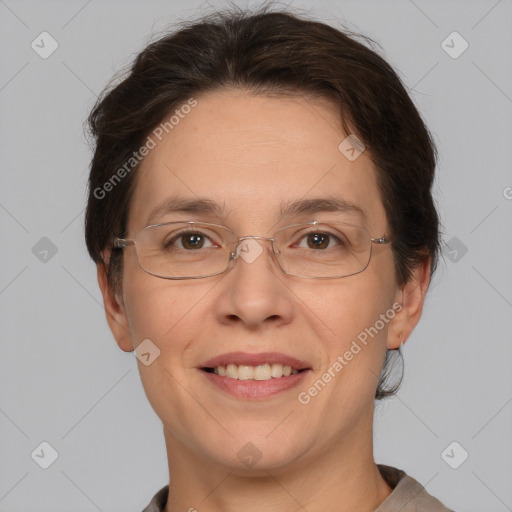 Joyful white adult female with short  brown hair and brown eyes