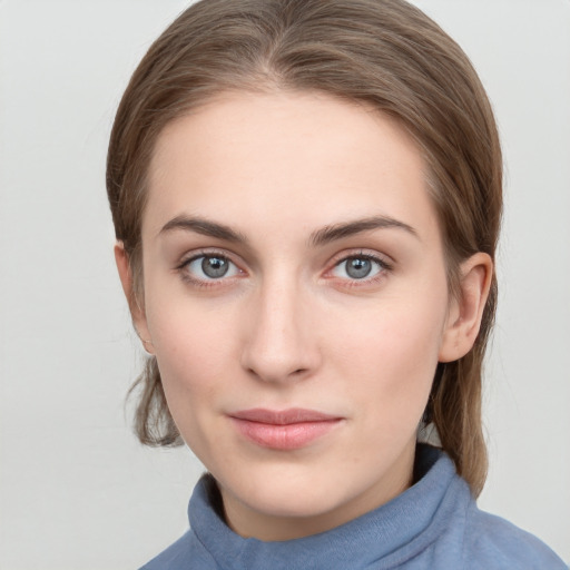 Neutral white young-adult female with medium  brown hair and blue eyes