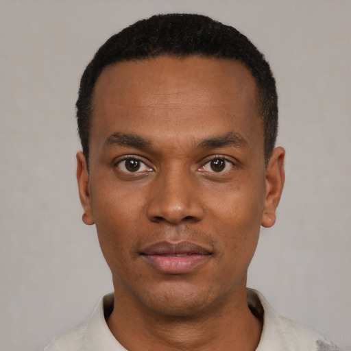 Neutral black young-adult male with short  black hair and brown eyes