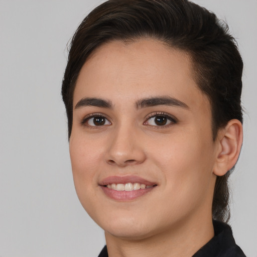 Joyful white young-adult female with medium  brown hair and brown eyes