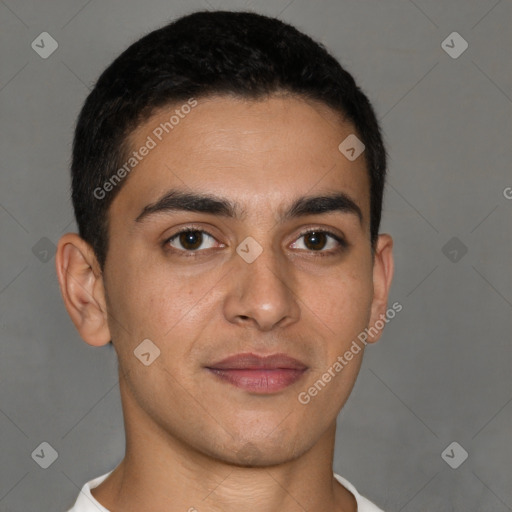 Joyful latino young-adult male with short  brown hair and brown eyes