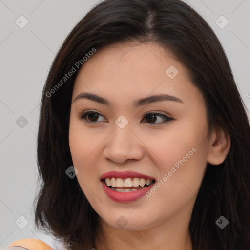 Joyful asian young-adult female with long  brown hair and brown eyes