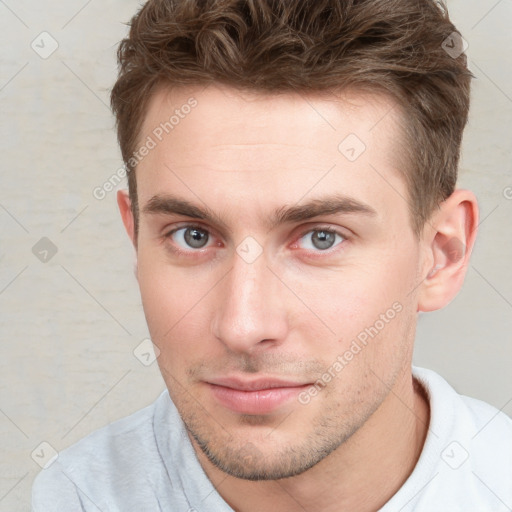 Neutral white young-adult male with short  brown hair and grey eyes