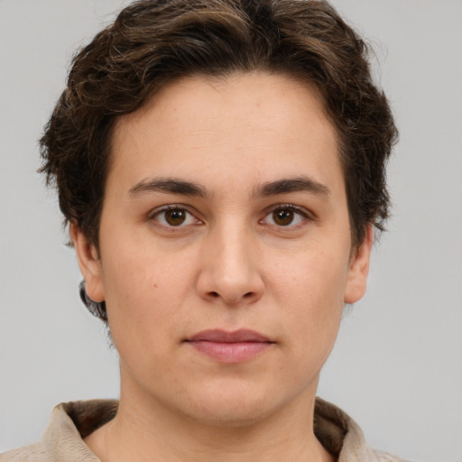 Neutral white young-adult female with short  brown hair and brown eyes