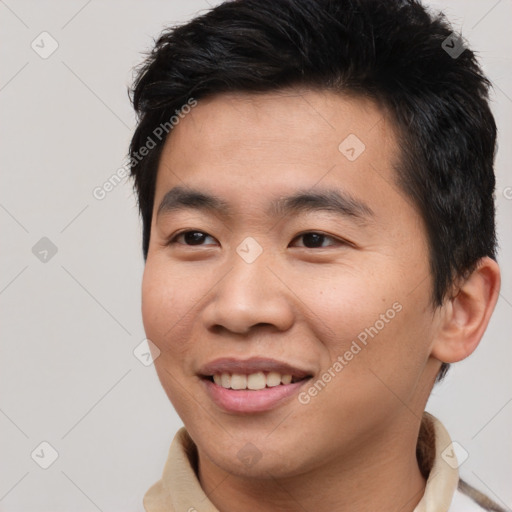 Joyful asian young-adult male with short  brown hair and brown eyes