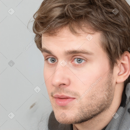 Neutral white young-adult male with short  brown hair and grey eyes