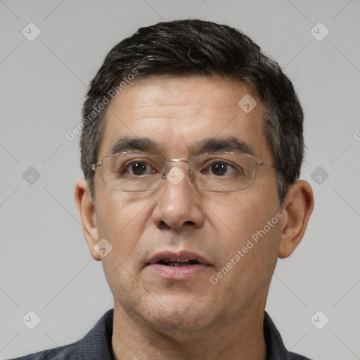 Neutral white adult male with short  black hair and brown eyes