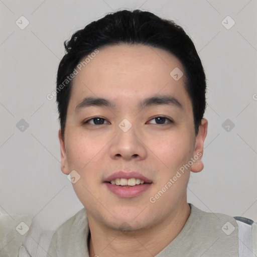 Joyful asian young-adult male with short  black hair and brown eyes