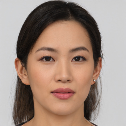Neutral asian young-adult female with medium  brown hair and brown eyes