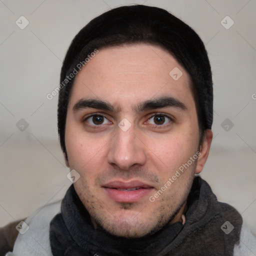 Joyful white young-adult male with short  black hair and brown eyes