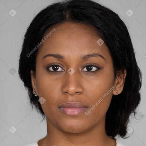 Neutral black young-adult female with medium  black hair and brown eyes