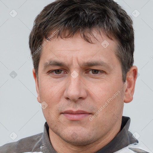 Neutral white adult male with short  brown hair and brown eyes