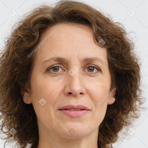 Joyful white adult female with long  brown hair and brown eyes