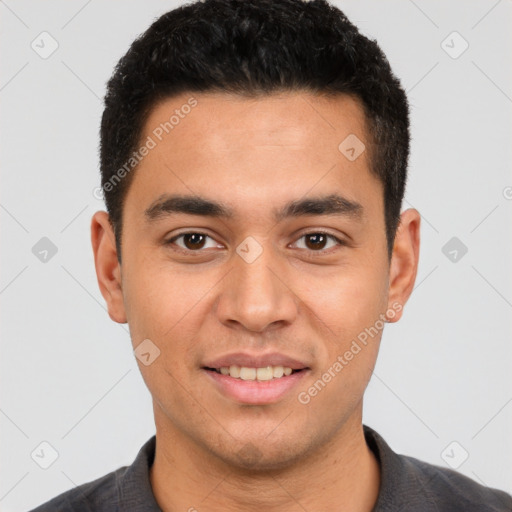 Joyful white young-adult male with short  black hair and brown eyes