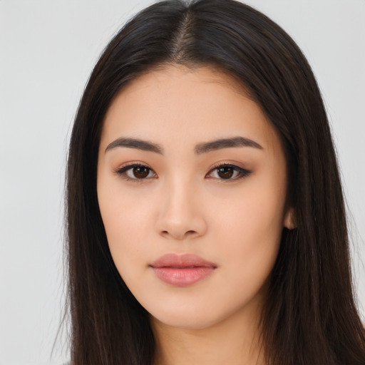Neutral asian young-adult female with long  brown hair and brown eyes