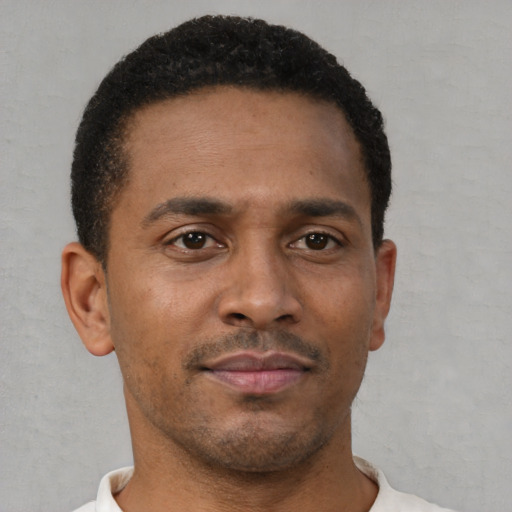 Neutral black young-adult male with short  brown hair and brown eyes