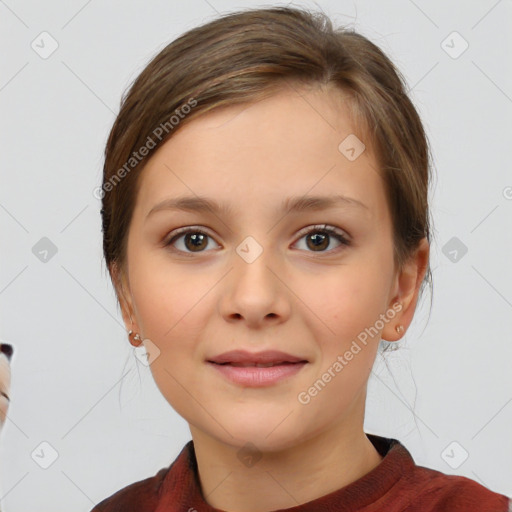 Joyful white child female with medium  brown hair and brown eyes