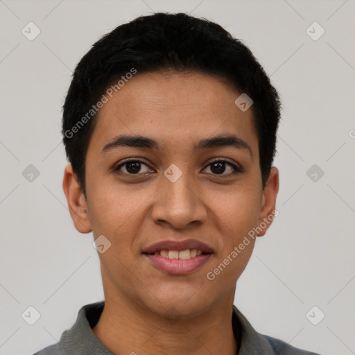 Joyful latino young-adult female with short  black hair and brown eyes