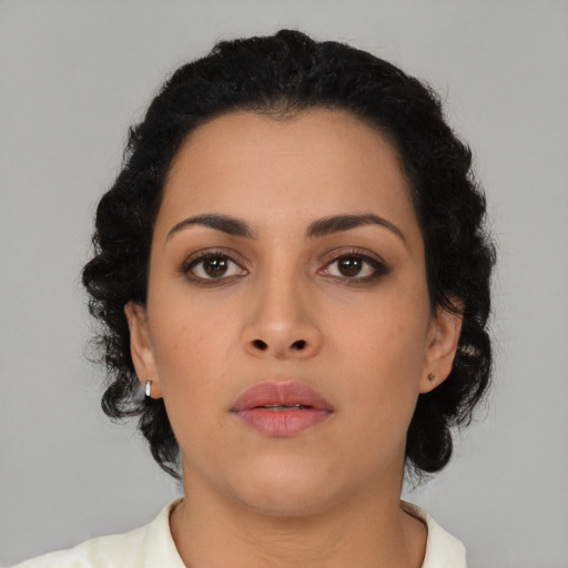 Neutral latino young-adult female with short  black hair and brown eyes