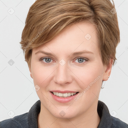 Joyful white young-adult female with short  brown hair and grey eyes