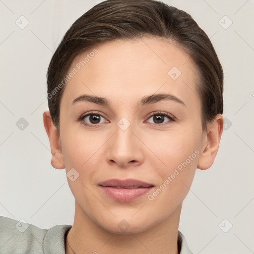 Joyful white young-adult female with short  brown hair and brown eyes