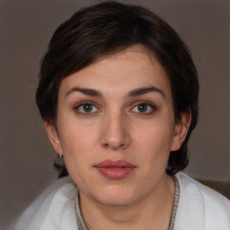 Neutral white young-adult female with short  brown hair and brown eyes