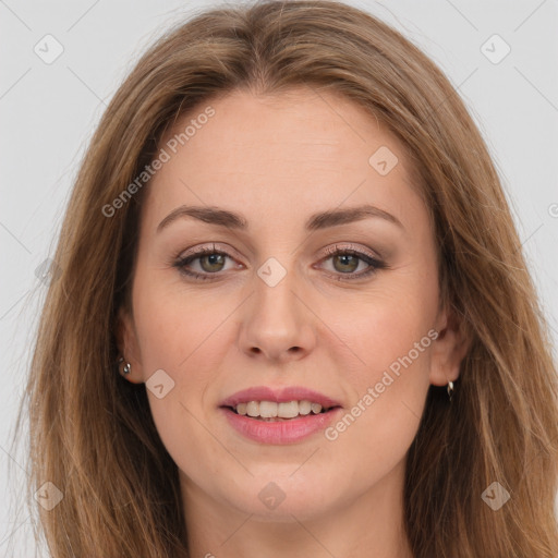 Joyful white young-adult female with long  brown hair and green eyes