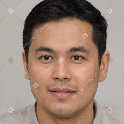 Joyful white young-adult male with short  black hair and brown eyes