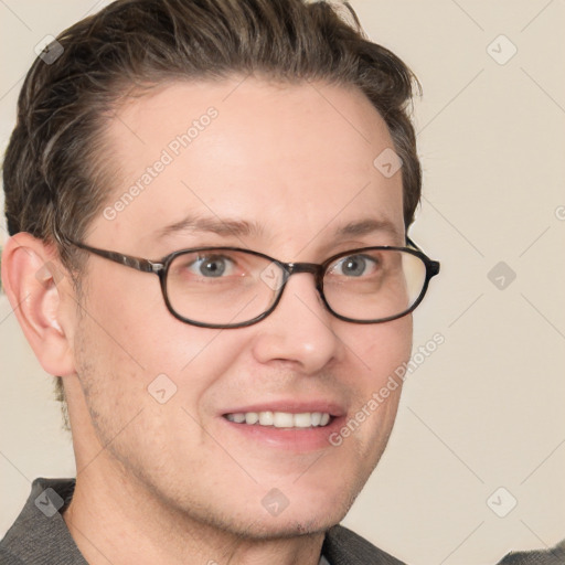 Joyful white adult male with short  brown hair and grey eyes