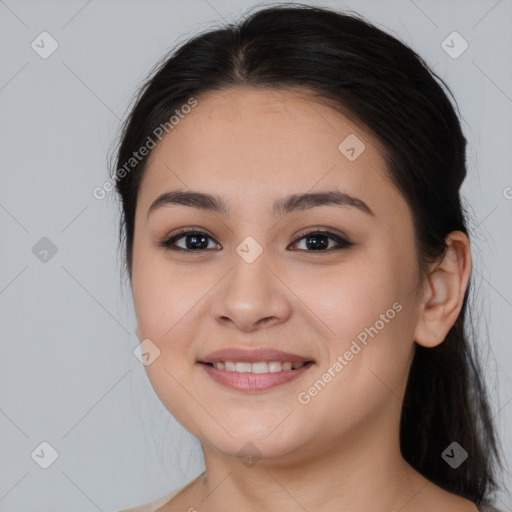 Joyful white young-adult female with long  brown hair and brown eyes