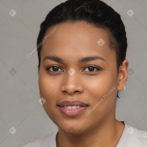 Joyful black young-adult female with short  black hair and brown eyes