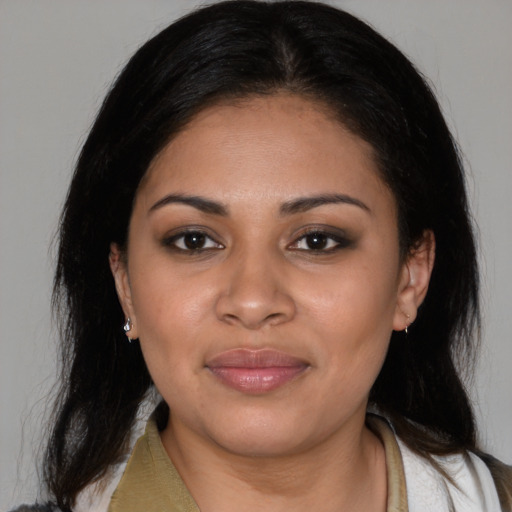 Joyful black young-adult female with medium  black hair and brown eyes