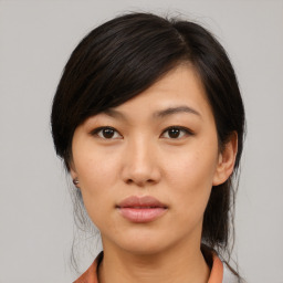 Neutral asian young-adult female with medium  black hair and brown eyes