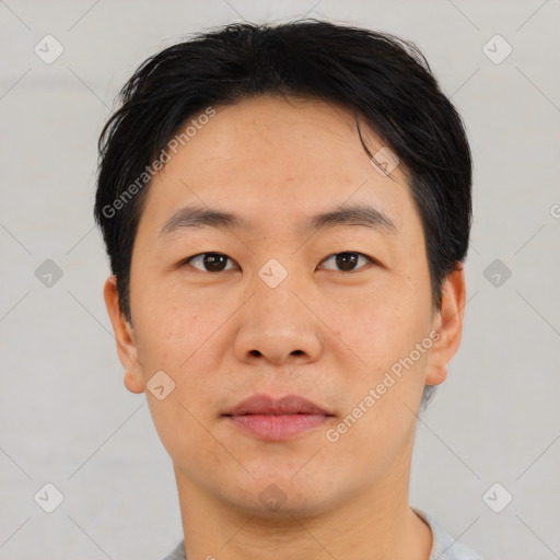 Neutral asian young-adult male with short  black hair and brown eyes