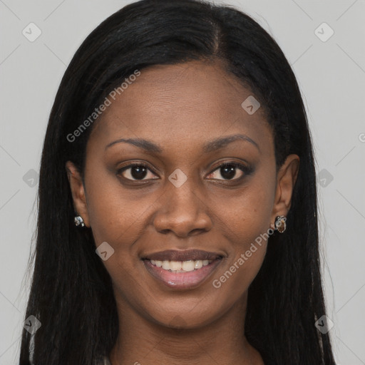 Joyful black young-adult female with long  brown hair and brown eyes